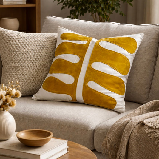Decorative outdoor & indoor pillow waterproof with yellow abstract leaf pattern made from upcycled air mattresses