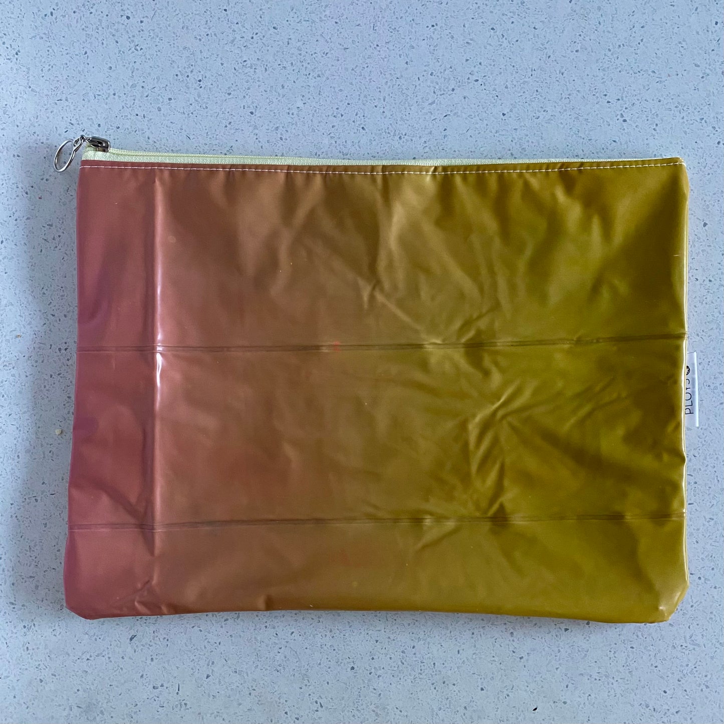 Waterproof Wet and Dry Bag sustainably made from upcycled plastics, the best eco bag for swimmers and babies nappies for daycare.