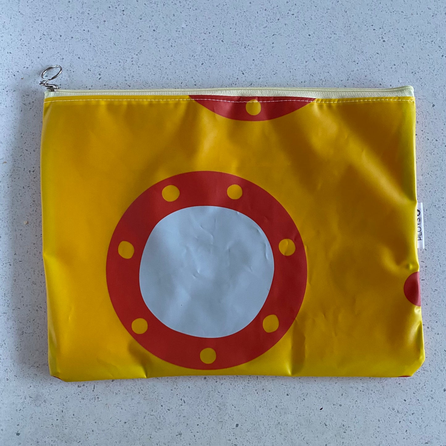 Waterproof Wet and Dry Bag sustainably made from upcycled plastics, the best eco bag for swimmers and babies nappies for daycare.