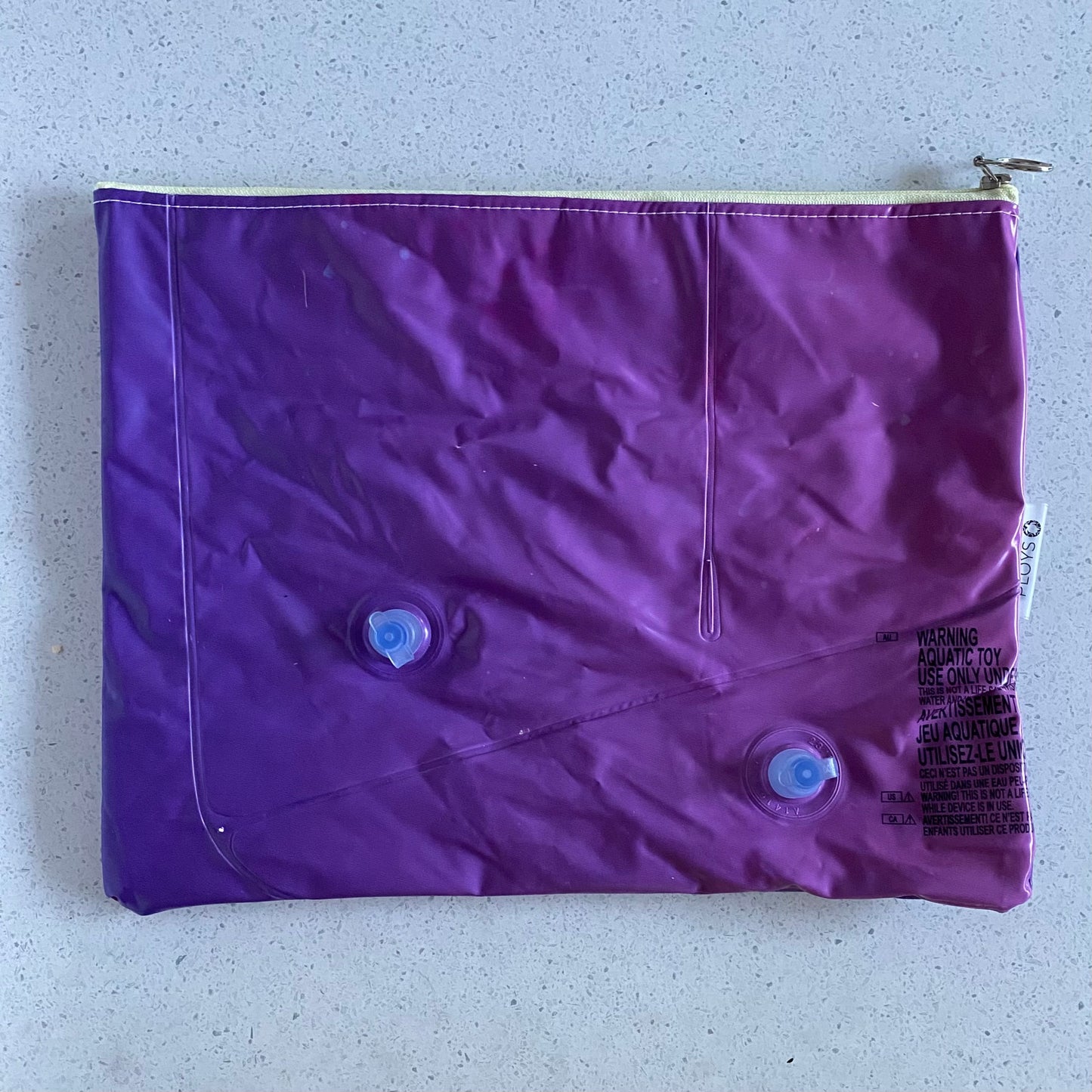 Waterproof Wet and Dry Bag sustainably made from upcycled plastics, the best eco bag for swimmers and babies nappies for daycare.