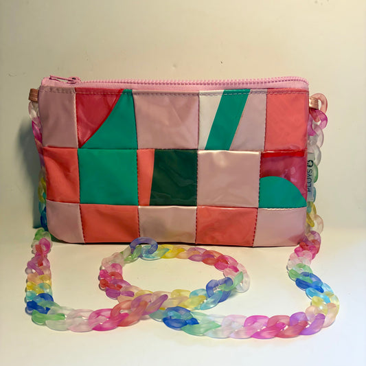 Colourful waterproof patchwork purse sustainably made from recycled plastic with a multicoloured chain strap