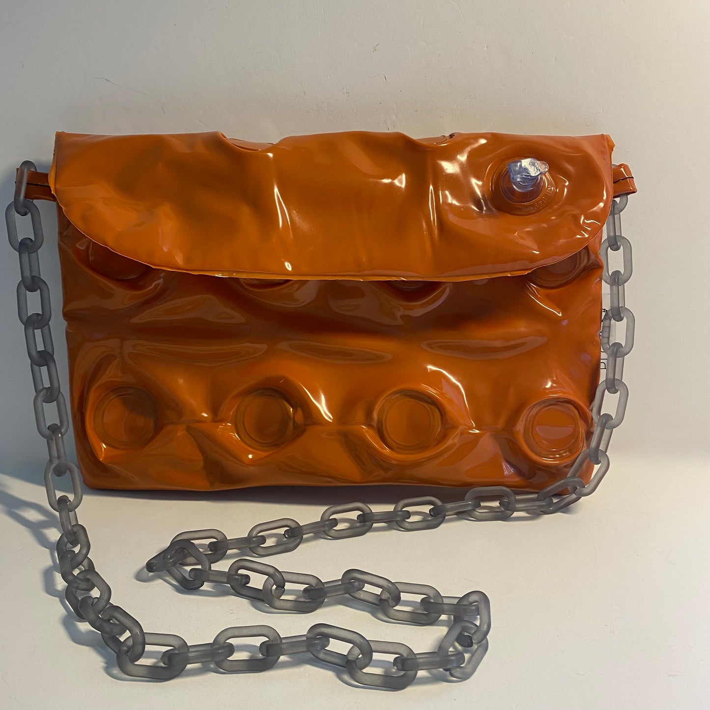 Evening purse or clutch made from upcycled pool inflatables