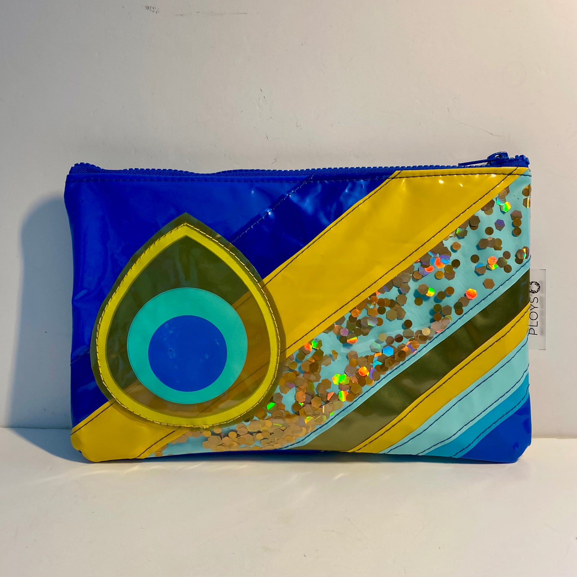 Unique sustainably handmade upcycled vegan slowfashion handbag with blue peacock design