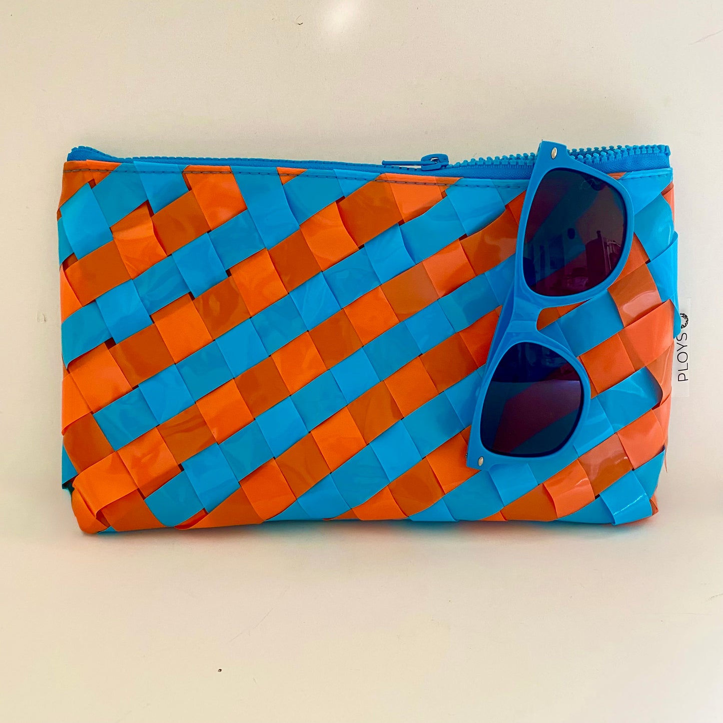 Unique and stunning sustainably handmade Erving purse upcycled vegan slowfashion handbag in orange and blue