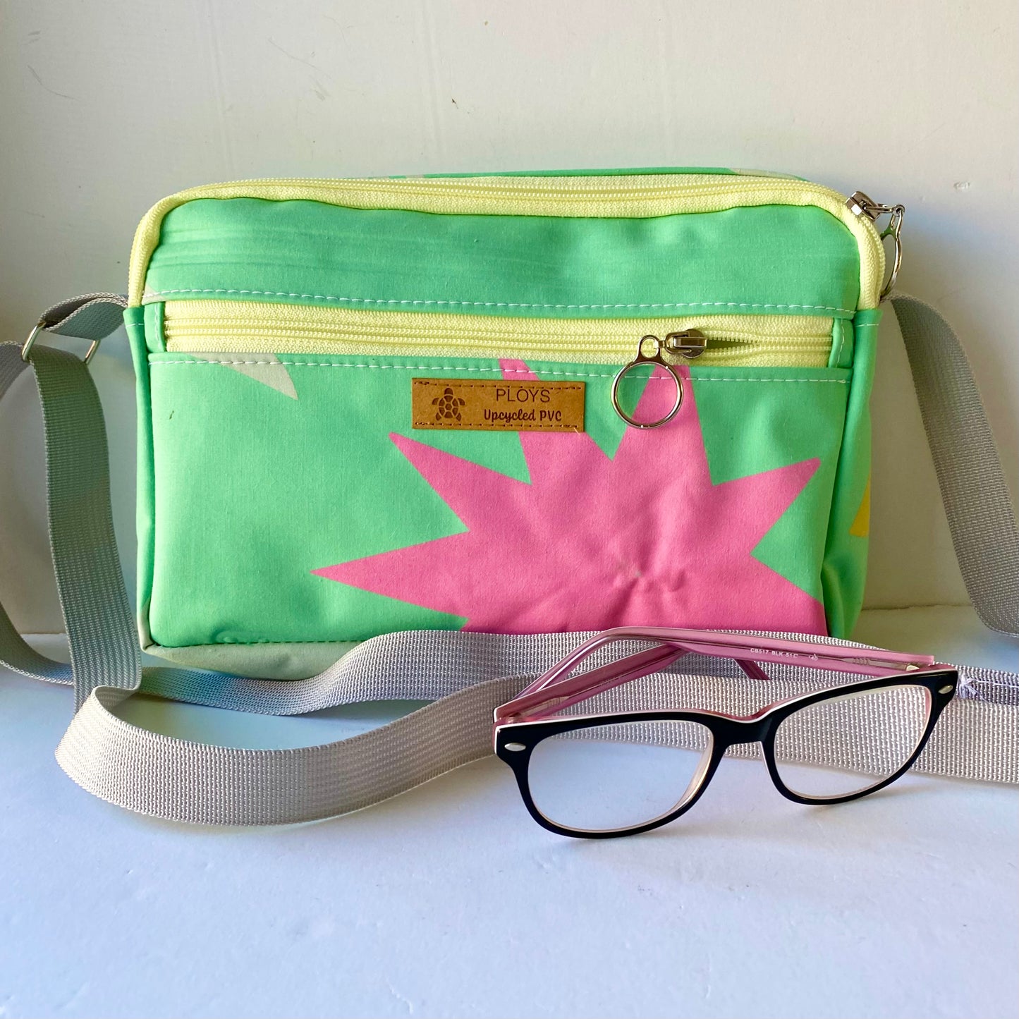 Unique waterproof shoulder bag in biker style made from recycled and upcycled air mattresses