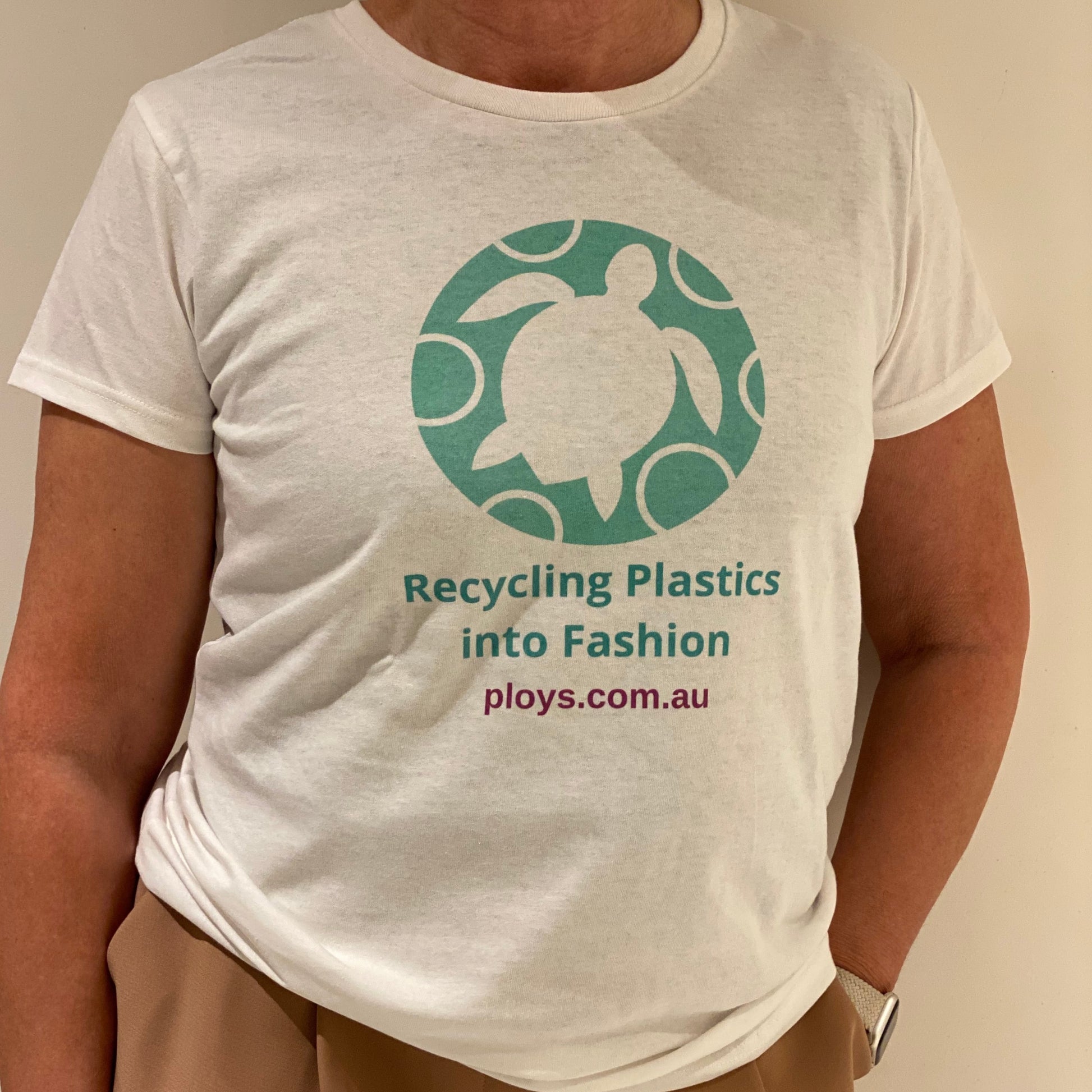 Eco sea turtle tshirt with message to keep oceans plastic free in white and teal and float to fashion text reflecting the PLOYS brand sustainable values