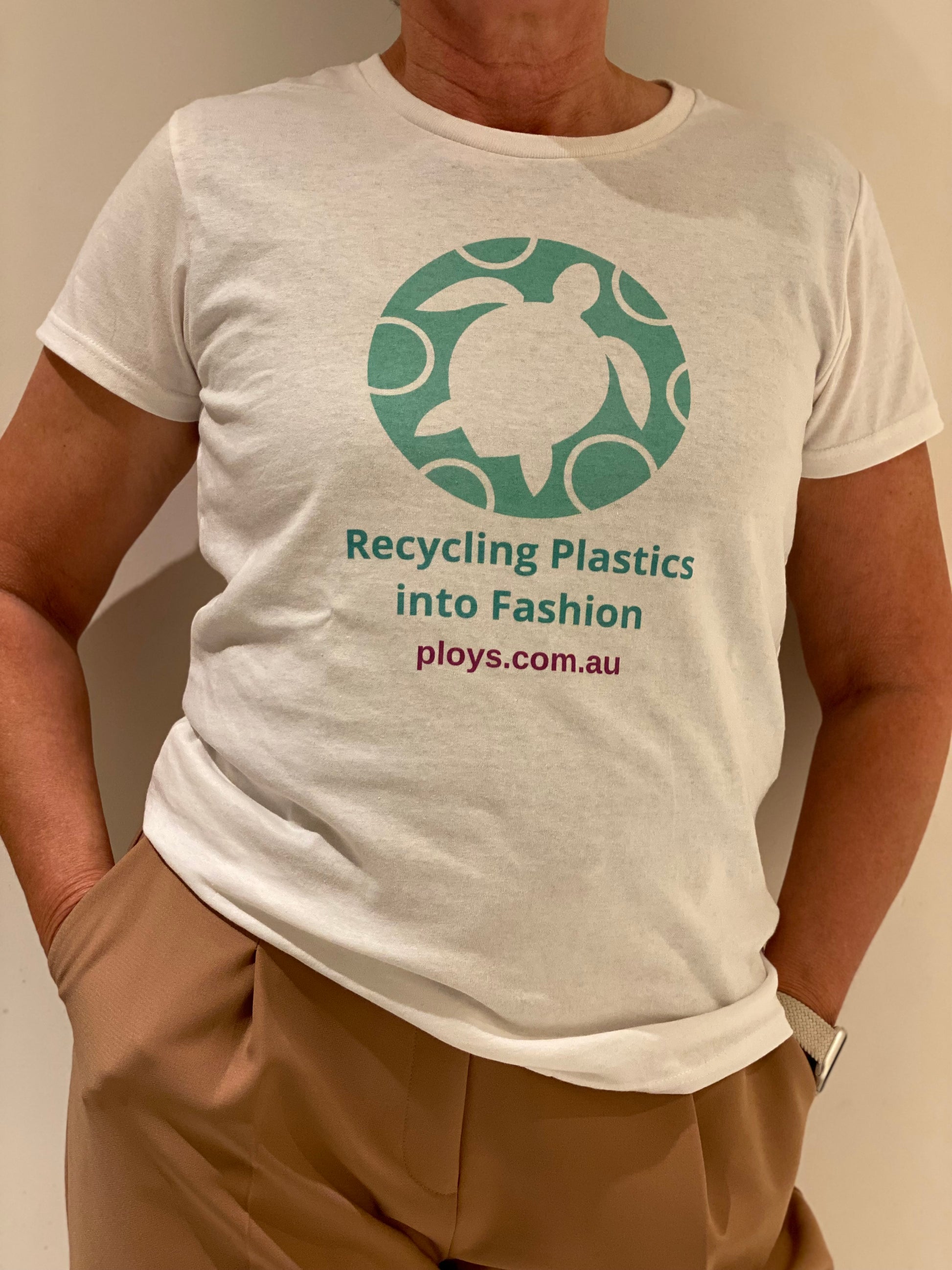 Eco sea turtle tshirt with message to keep oceans plastic free in white and teal and float to fashion text reflecting the PLOYS brand sustainable values