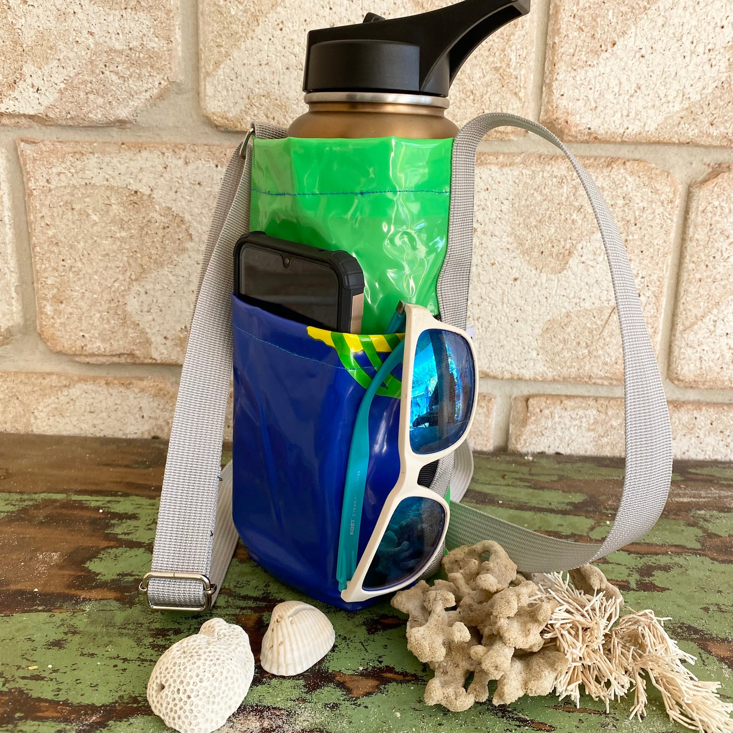 Water Bottle & Mobile Phone Carrier made from recycled pool inflatables