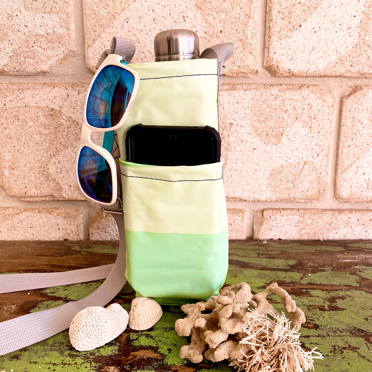 Water Bottle & Mobile Phone Carrier made from recycled pool inflatables