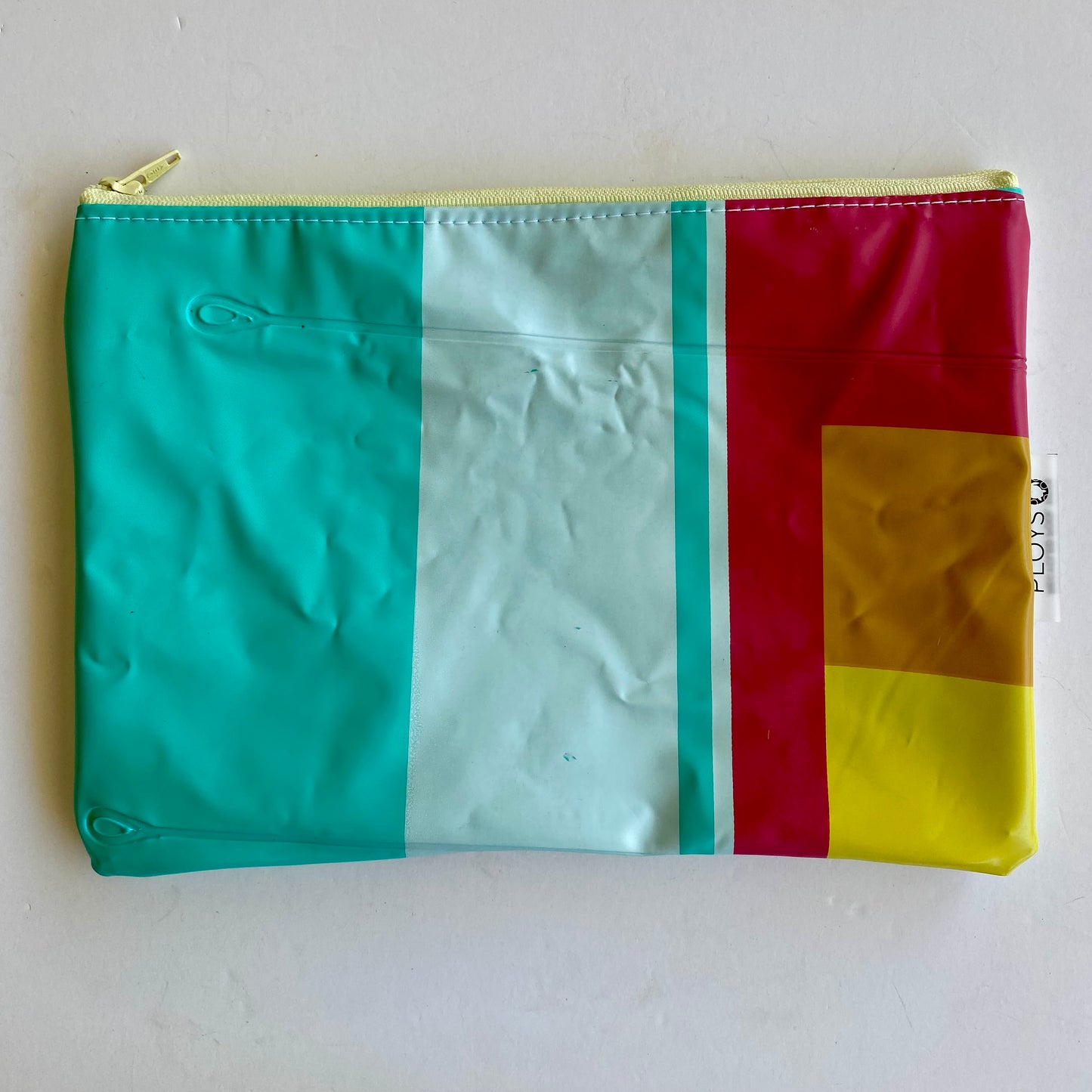 Waterproof Wet and Dry Bag sustainably made from upcycled plastics, the best eco bag for period undies, swimmers and babies nappies.