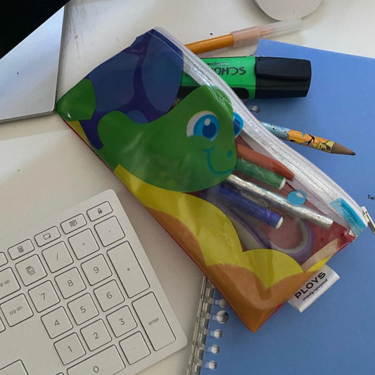 Medium size purse made from recycled pool inflatables ideal as pencil case or for mobile phone, sunglasses or cosmetics.