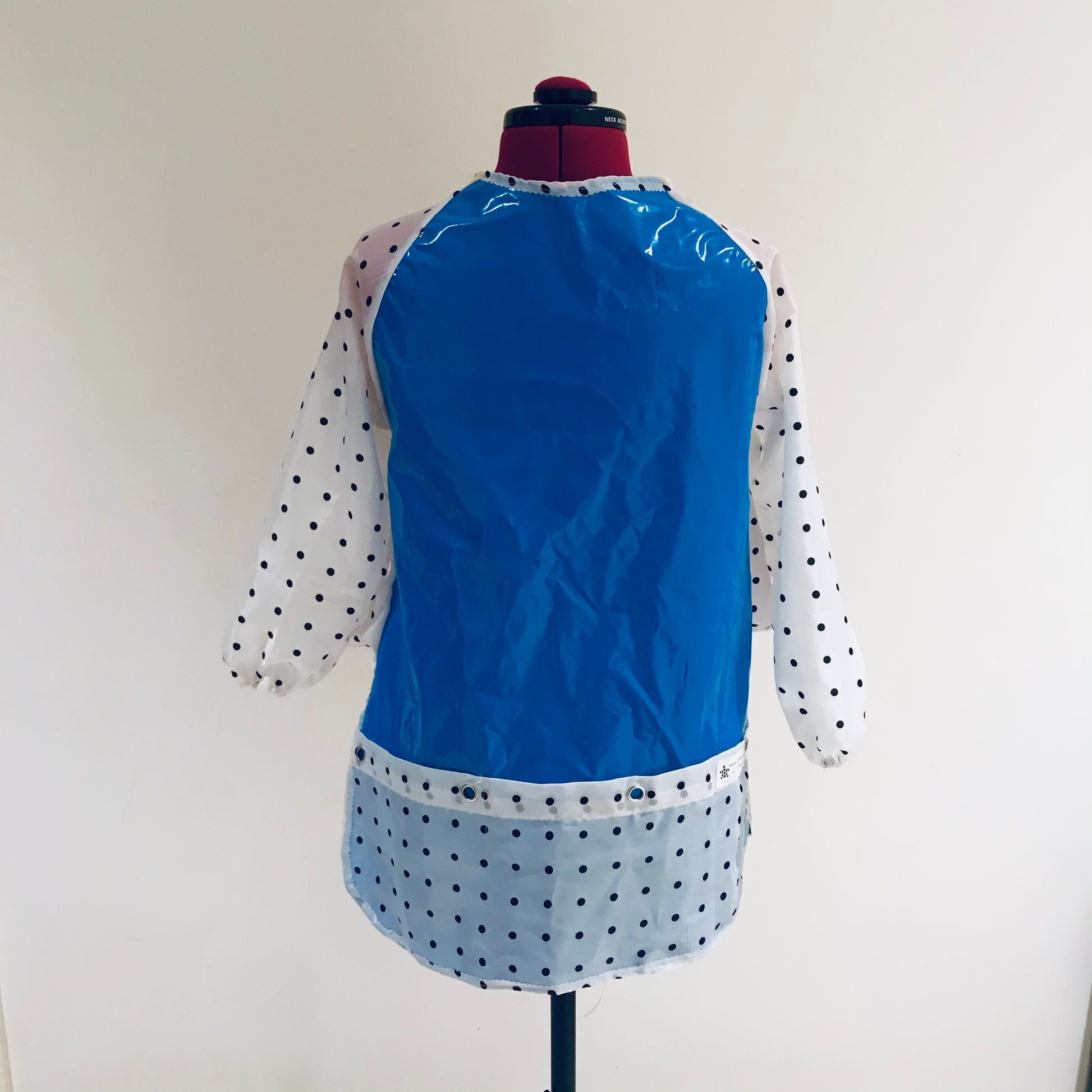 Art smock, water resistant recycled pool inflatables and shower curtain