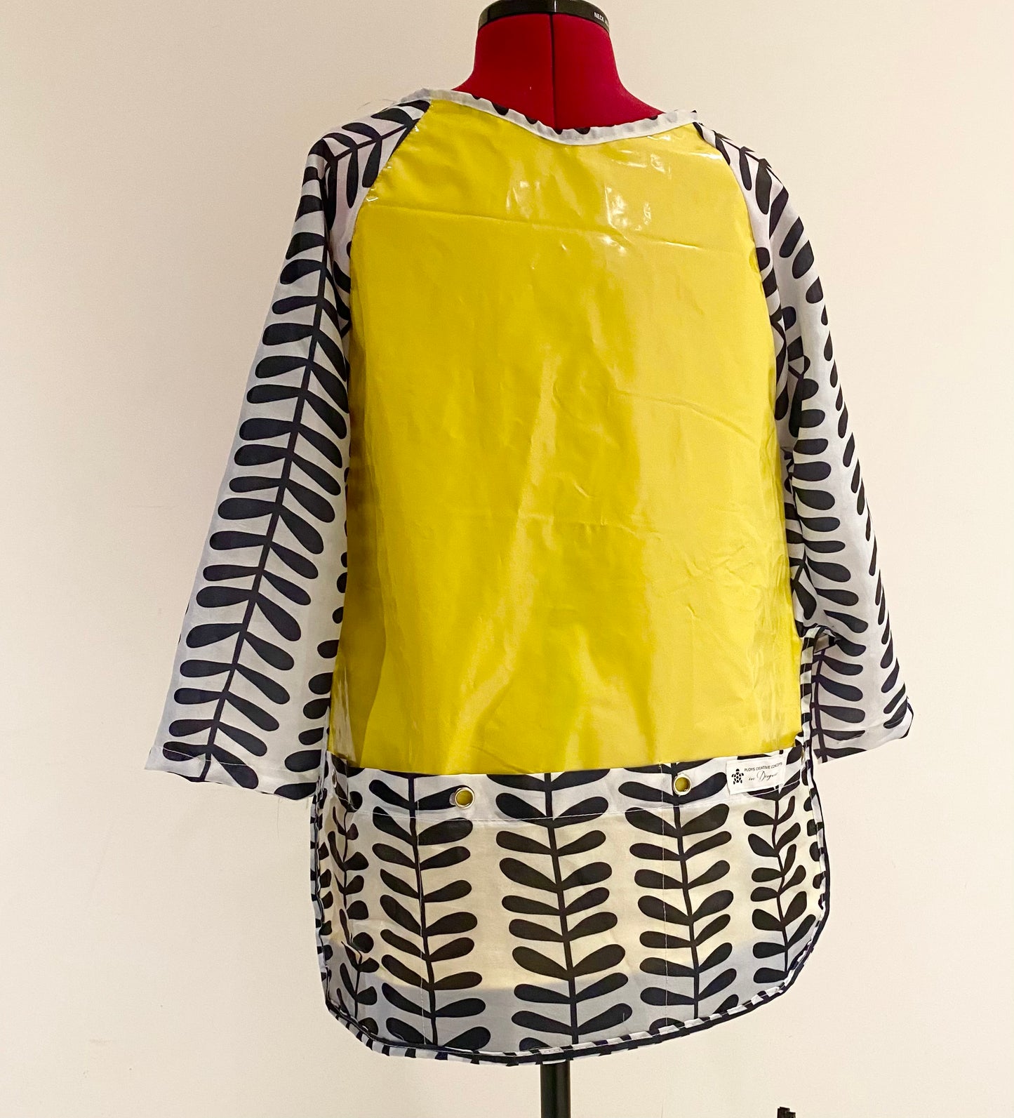 Art smock, water resistant recycled pool inflatables and shower curtain