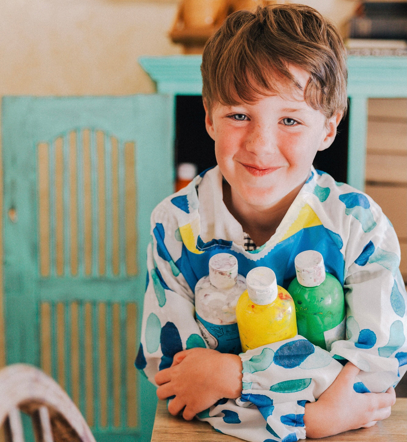 Art smock, water resistant recycled pool inflatables and shower curtain