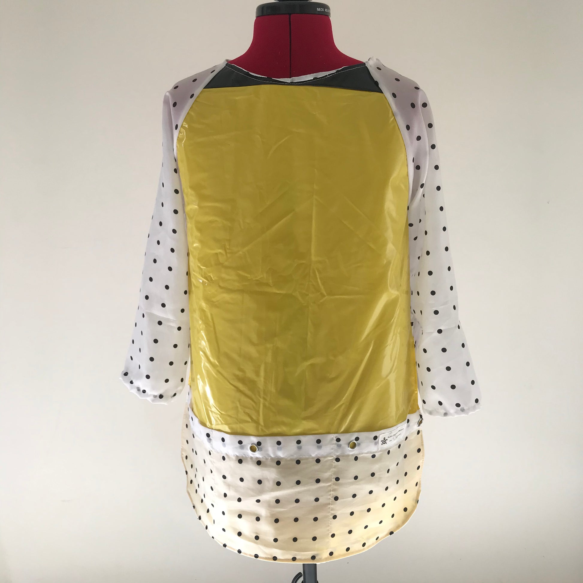 Art smock, water resistant recycled pool inflatables and shower curtain