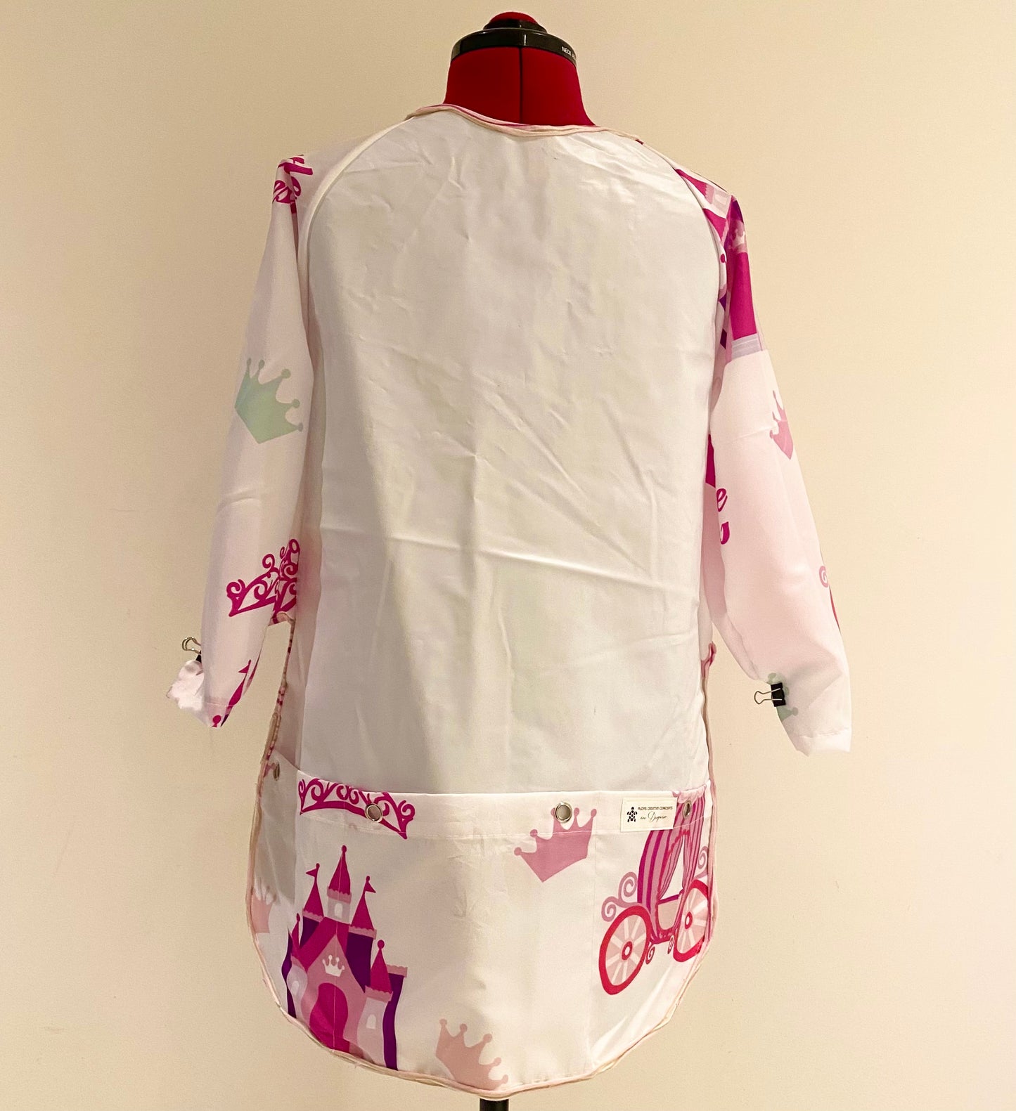 Art smock, water resistant recycled pool inflatables and shower curtain