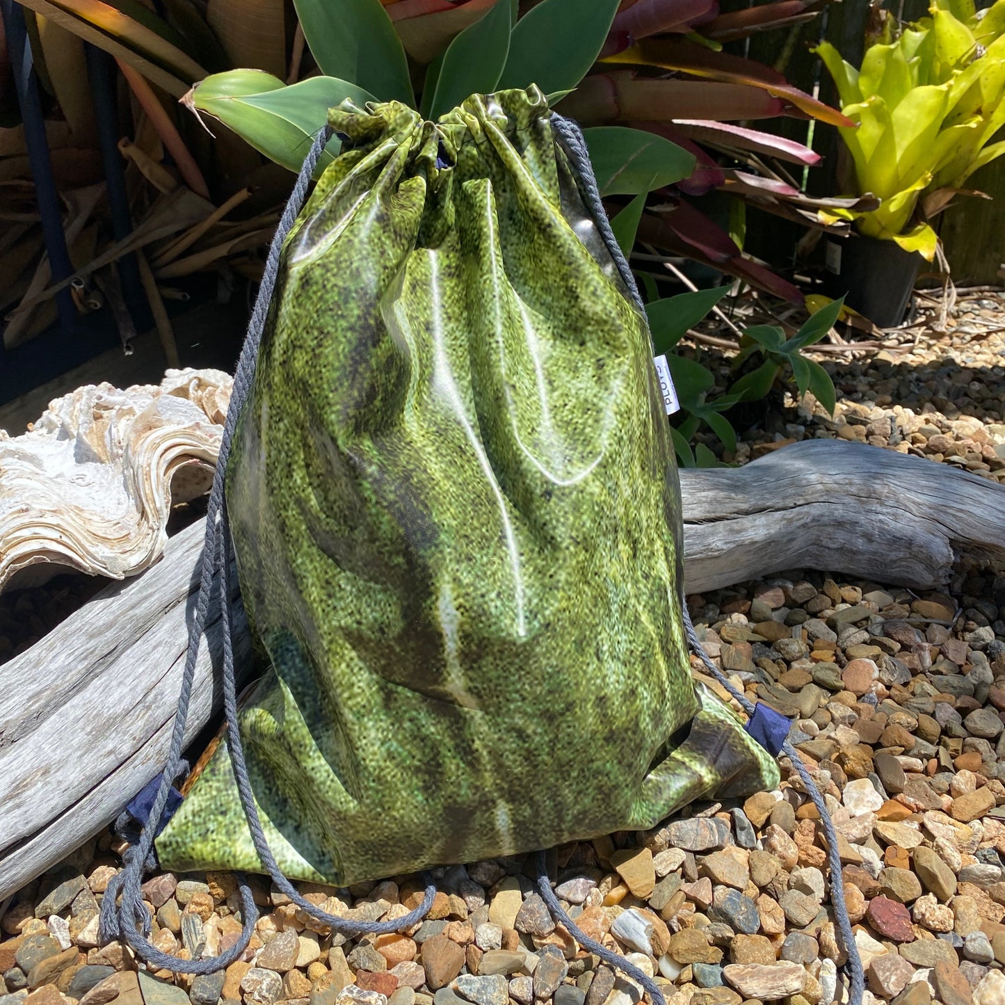Swim bag made from recycled pool inflatables, lined with ripstop fabric. Perfect water resistant bag for swimming, sports and shop. Made from recycled PVC
