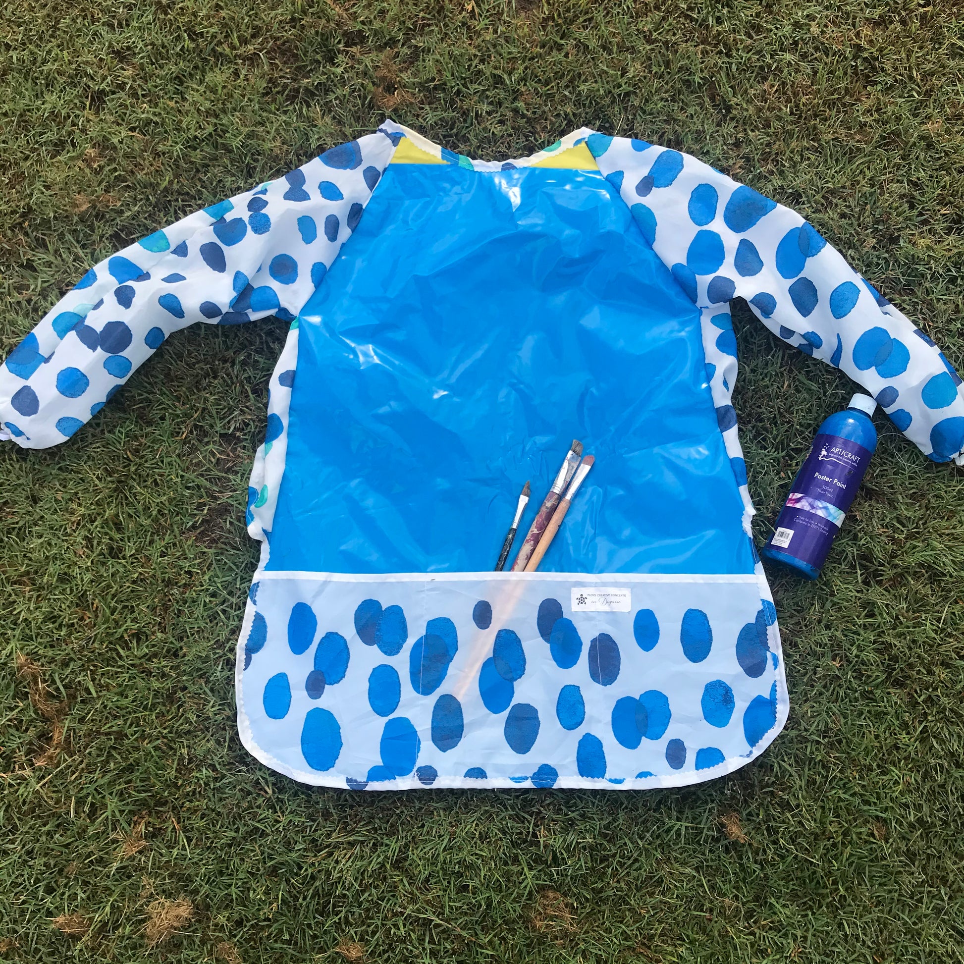 Art smock, water resistant recycled pool inflatables and shower curtain