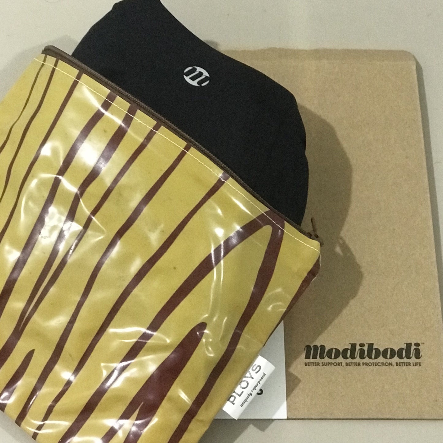 Period undies purse waterproof made from recycled pool inflatables.