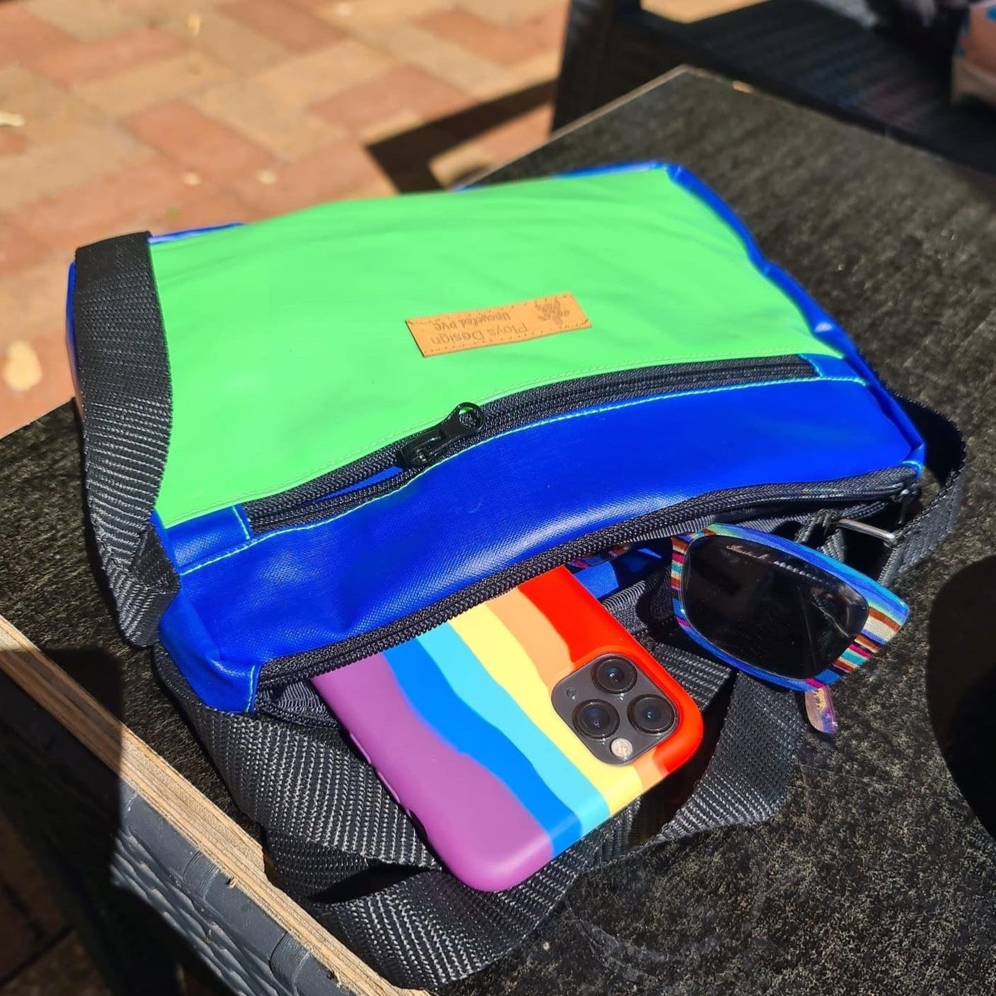 Cross body body bag at cafe drinking coffee with a friend