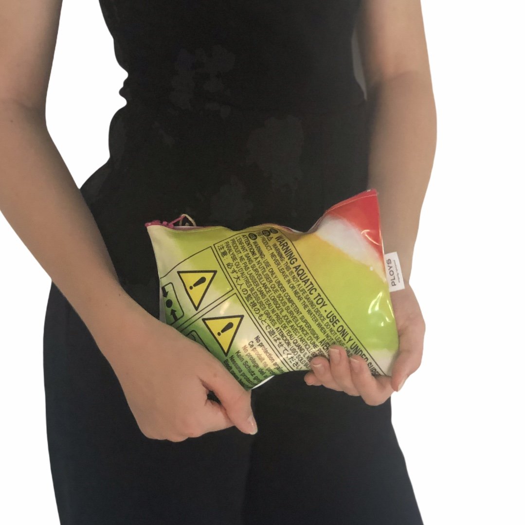 Small purse water resistant made from recycled pool inflatables, ideal as wet bag