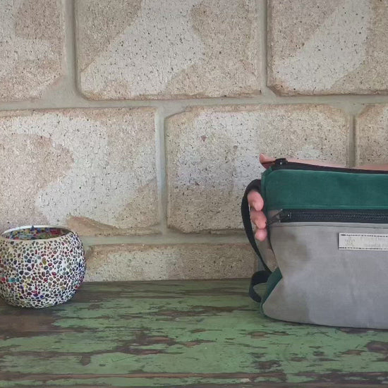 Video of packing the cross body bag with wallet, glasses, cosmetics and more