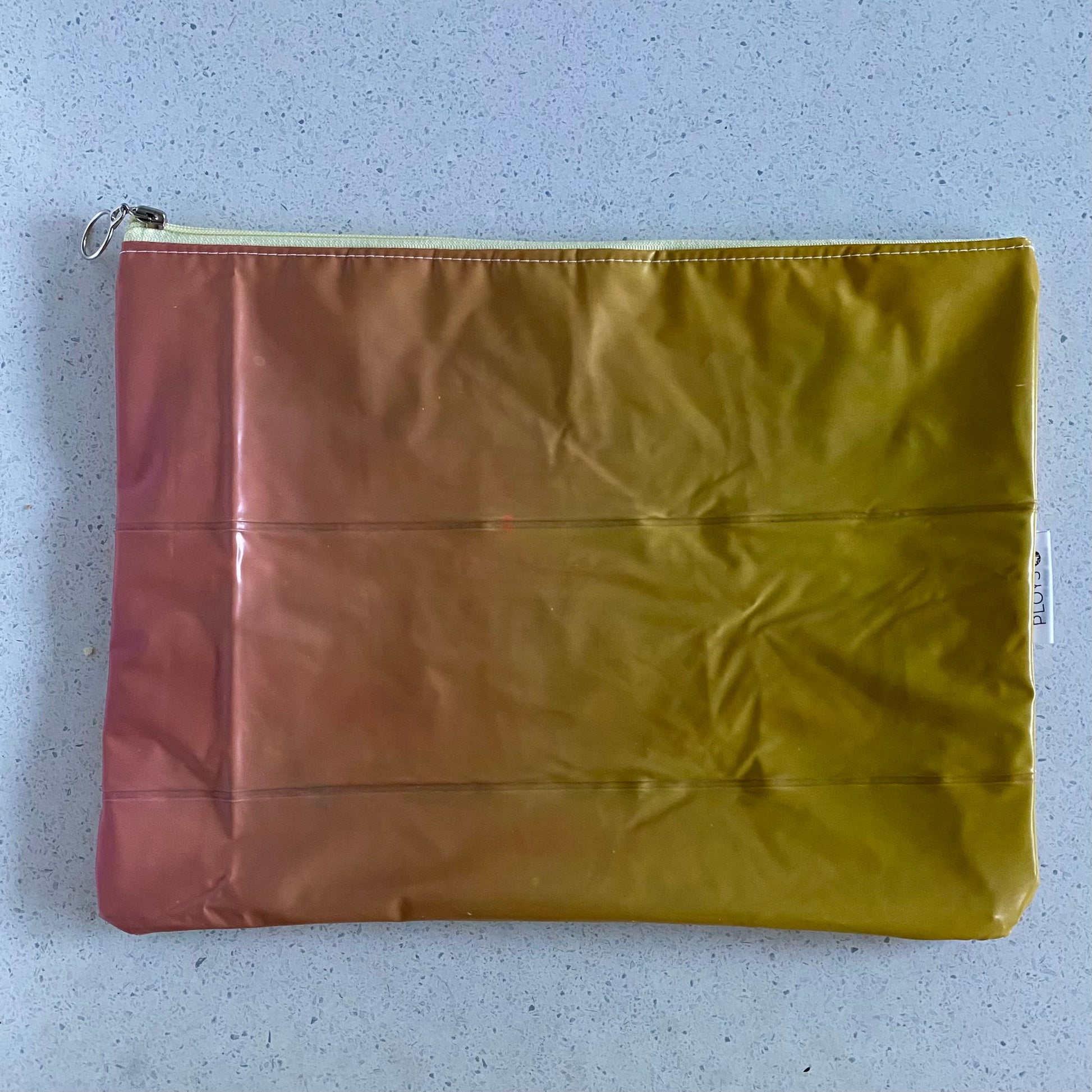 Waterproof Wet and Dry Bag sustainably made from upcycled plastics, the best eco bag for swimmers and babies nappies for daycare.
