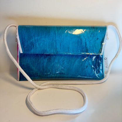 Vinyl art canvas clutch purse or cross body bag made from clear vinyl upcycled pvc sewn into sustainable purse