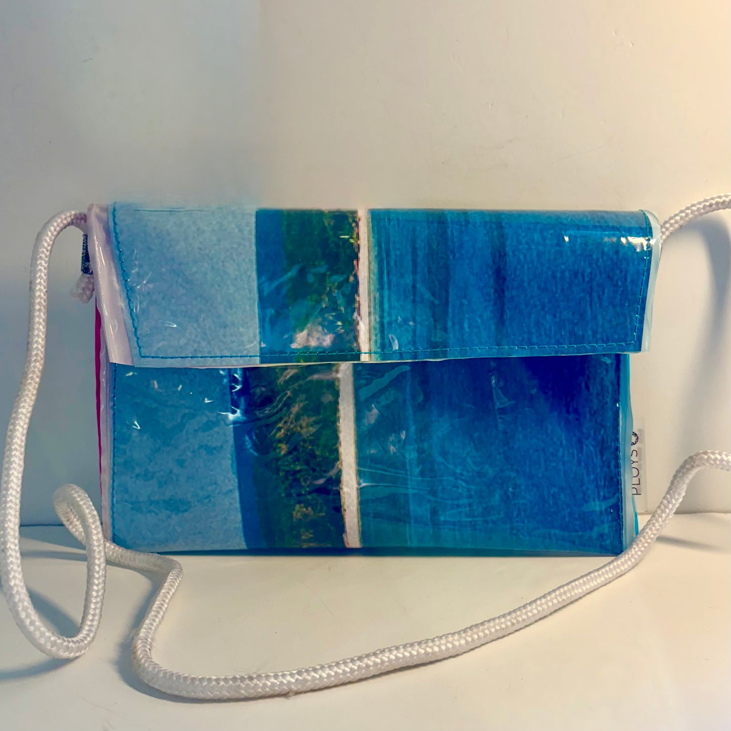 Blue and white upcycled handbag with reef island image and a strap