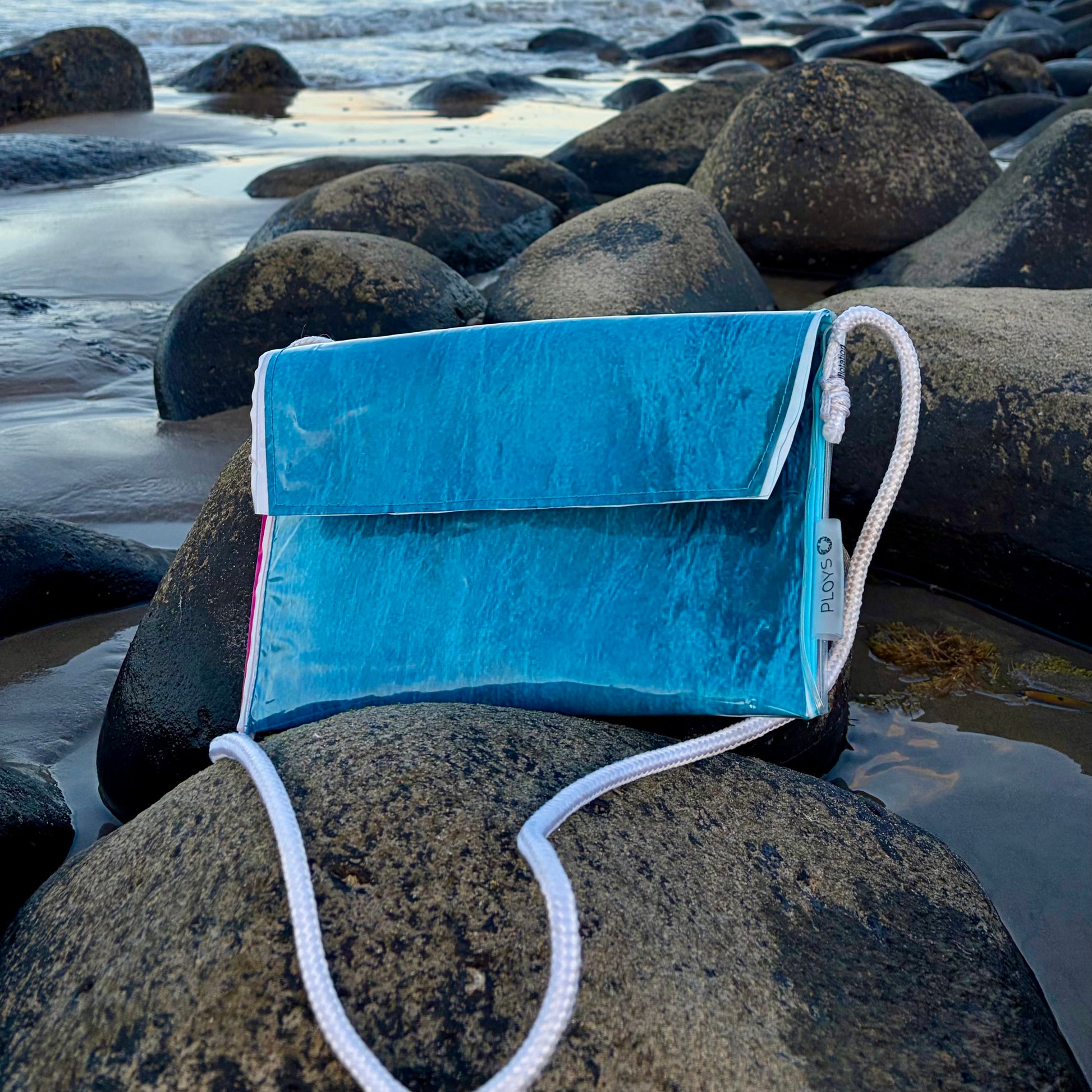 Vinyl art canvas clutch purse or cross body bag made from clear vinyl upcycled pvc sewn into sustainable purse