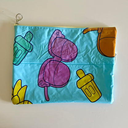 Wet Bag waterproof made from recycled pool floats with bright fun beach pattern recycling plastic waste 