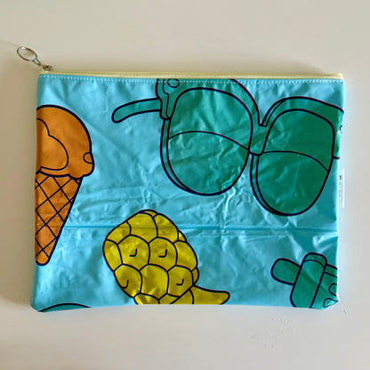 Wet Bag waterproof made from recycled pool floats with bright fun beach pattern recycling plastic waste 