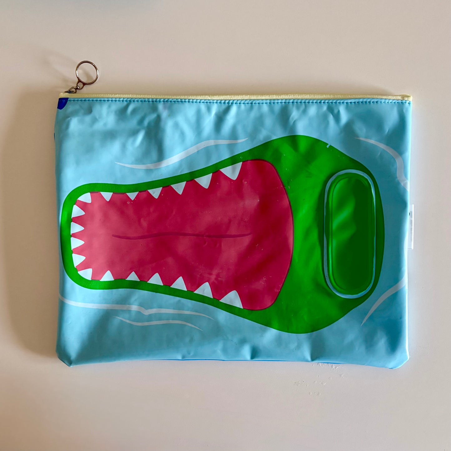 Wet Bag waterproof made from recycled pool floats with bright fun hippo pattern recycling plastic waste 