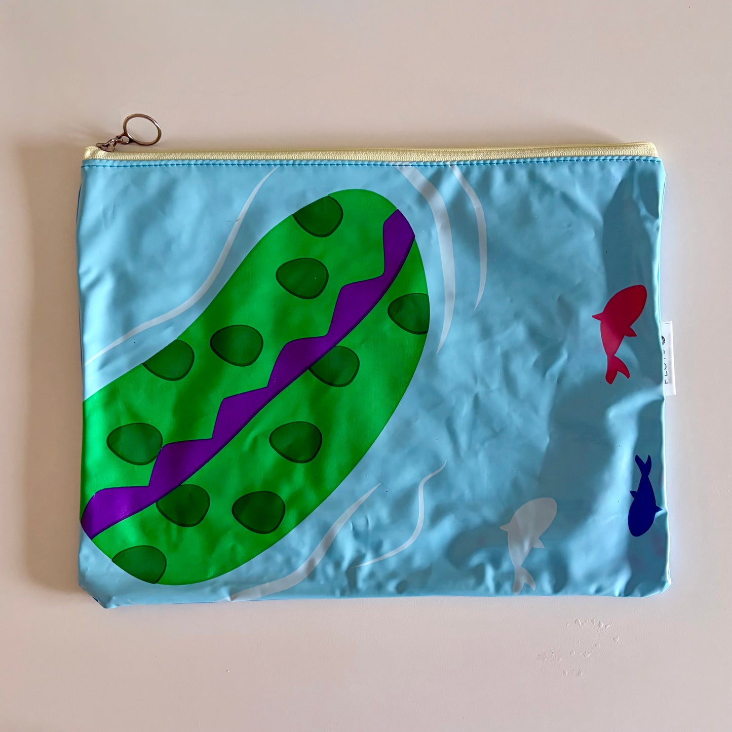 Waterproof Wet Bag made from recycled pool floats with bright fun fish pattern recycling plastic waste 