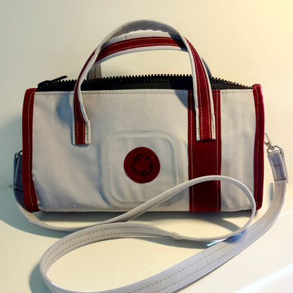 Sustainable recycled eco hand bag in retro 1950 style made from punctured inflatables 