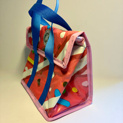 Lunch box bag waterproof and insulated made from recycled plastic pool inflatables. 