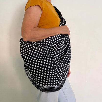 Tasuki duffel bag made from upcycled black and white pokerdot umbrellas perfect weekend away, light waterproof and spacious with long adjustable shoulder strap. 
