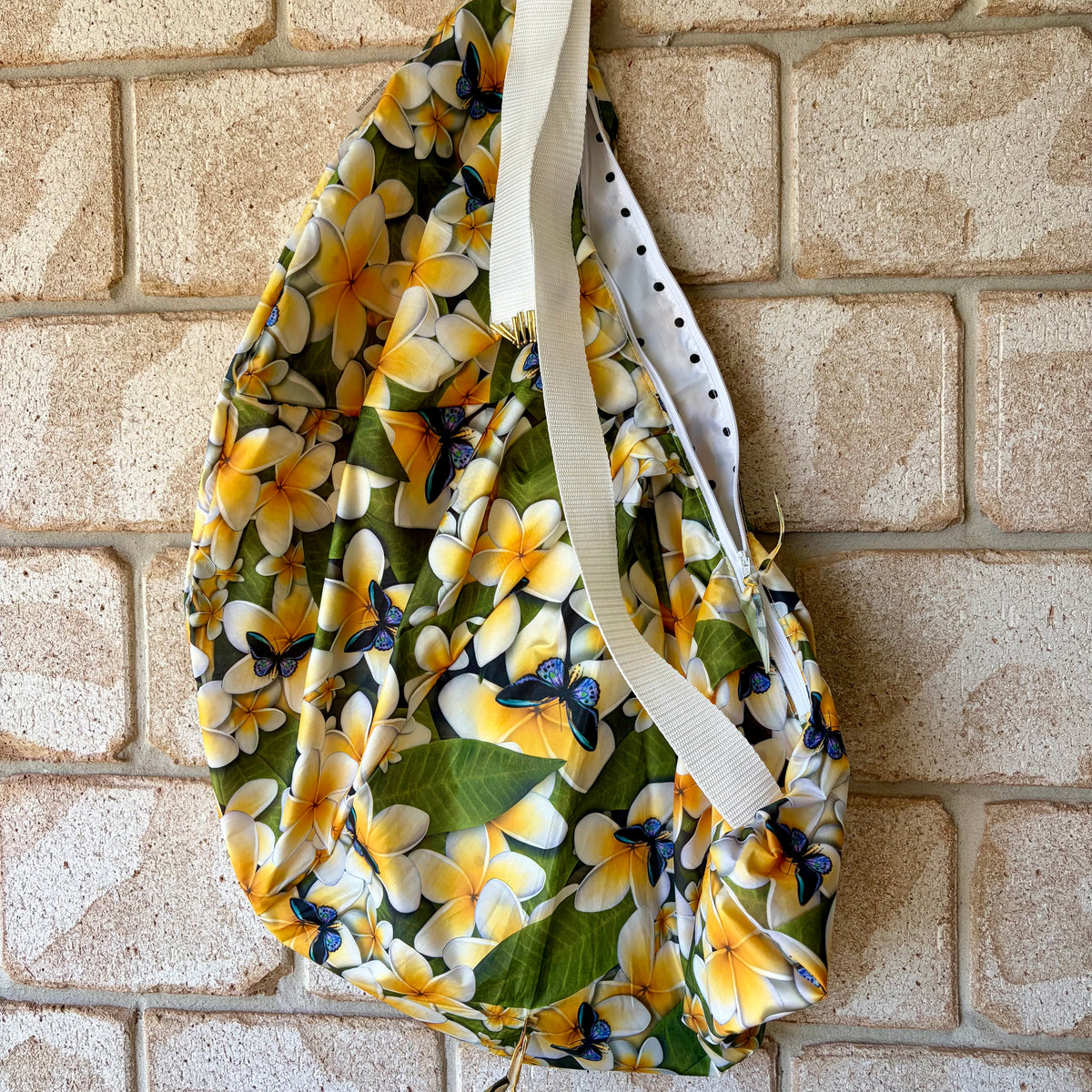 Tasuki duffel bag made from upcycled colourful umbrellas perfect weekend away, light waterproof and spacious with long adjustable shoulder strap.