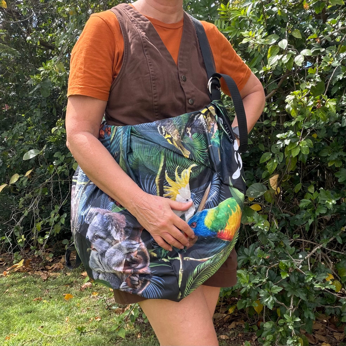 Tasuki duffel bag made from upcycled colourful umbrellas with native Australian animal prints perfect for a weekend away, light waterproof and spacious with long adjustable shoulder strap.