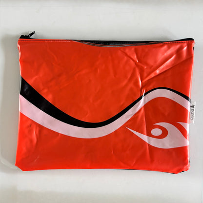 Wet Bag ideal for swimmers in orange with a black and white wave pattern made from an upcycled rubber boat 
