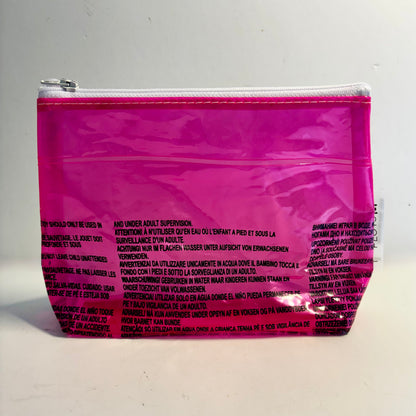 Upcycled cosmetics purse handmade from repurposed pool inflatables using recycled PVC plastic.