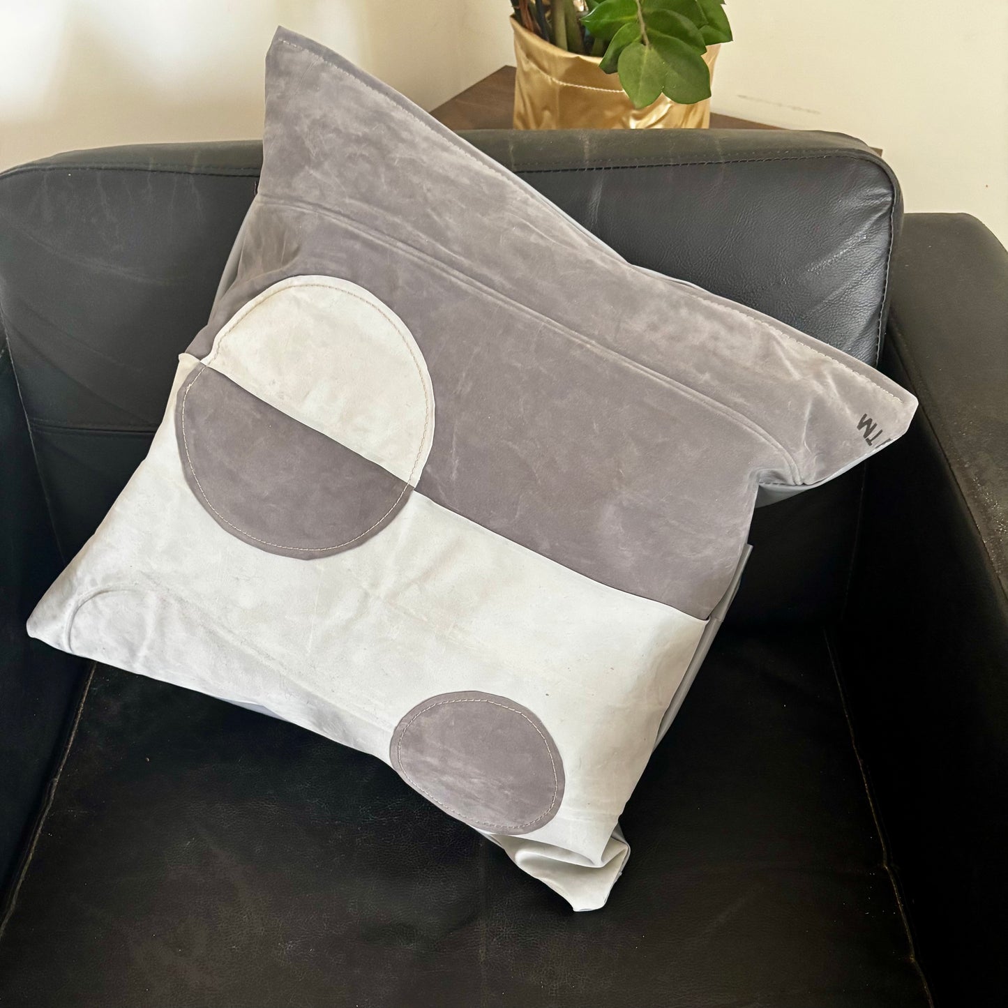 Eco-friendly cushion covers with geometric shapes crafted from upcycled inflatable air mattresses, durable, wipeable and weather-resistant