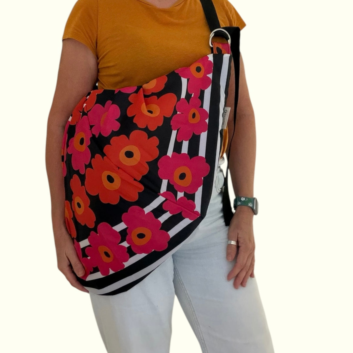 Tasuki duffel bag made from upcycled colourful umbrellas perfect weekend away, light waterproof and spacious with long adjustable shoulder strap.
