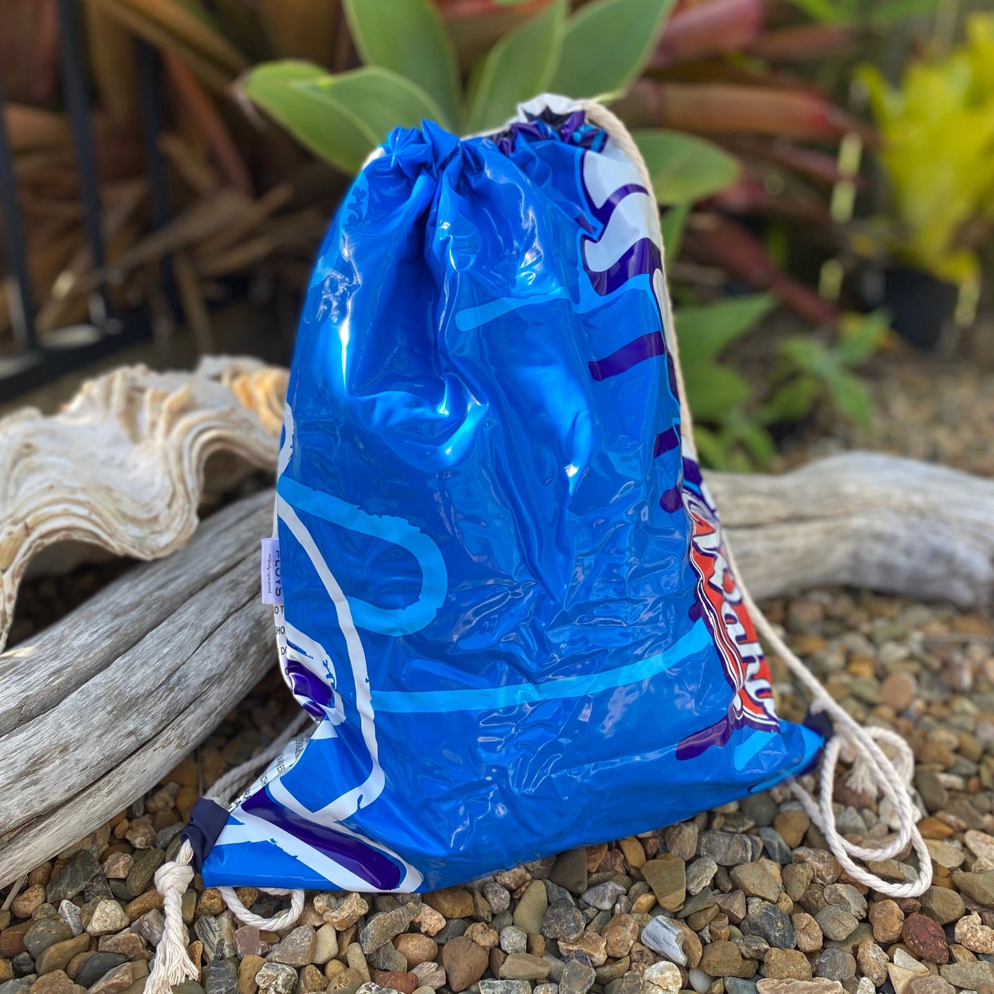 Swim bag made from recycled pool inflatables, lined with ripstop fabric. Perfect water resistant bag for swimming, sports and shop. Made from recycled PVC