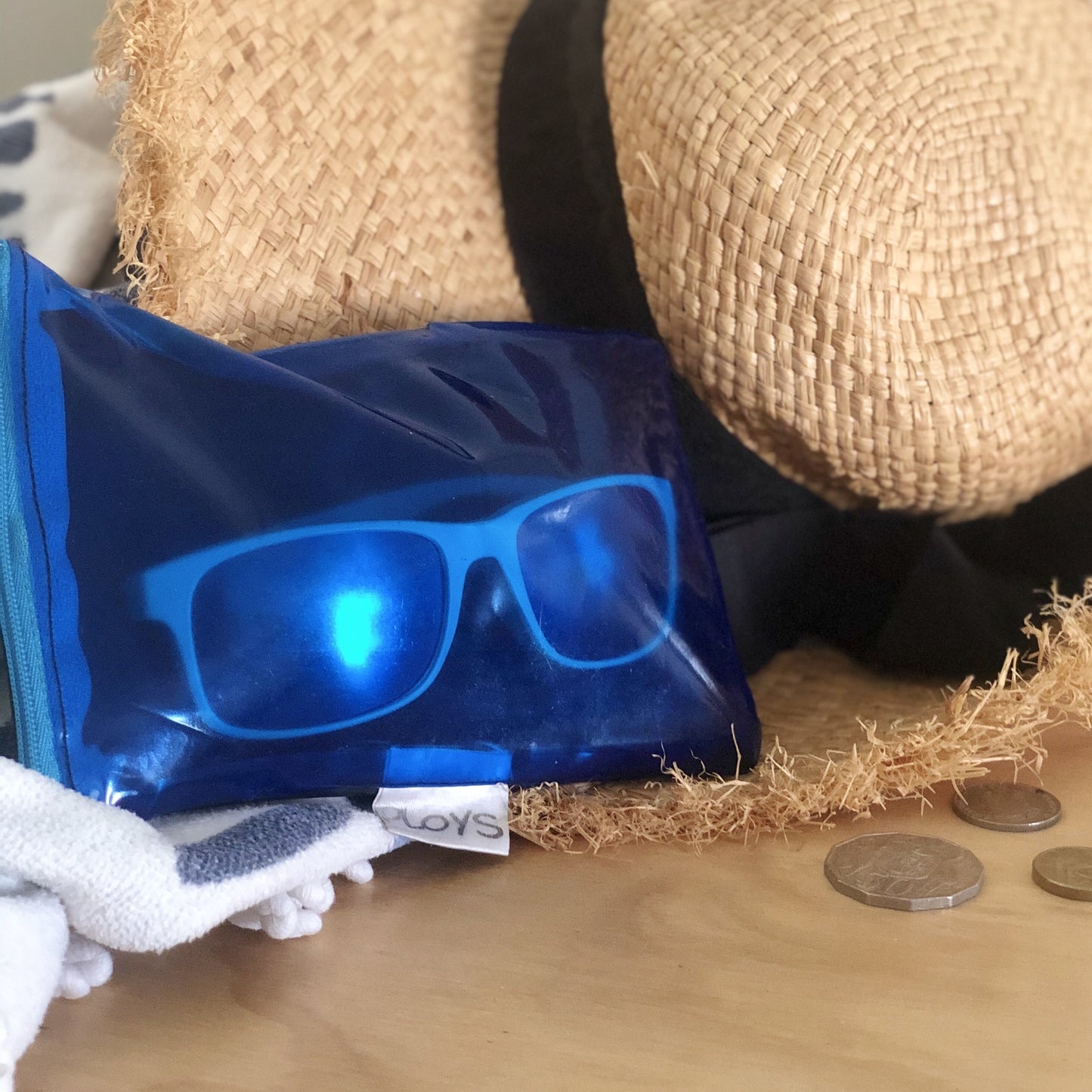 Sunglasses case or iPhone, smartphone case, made from upcycled PVC from pooltoys and airmattreses. Providing a durable sturdy protection against sand and damage. Water resistant
